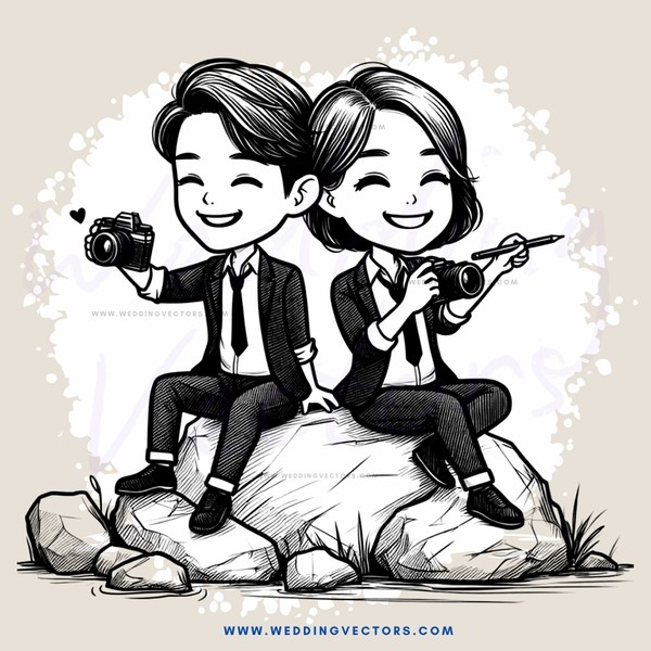 two people sitting on rocks with cameras